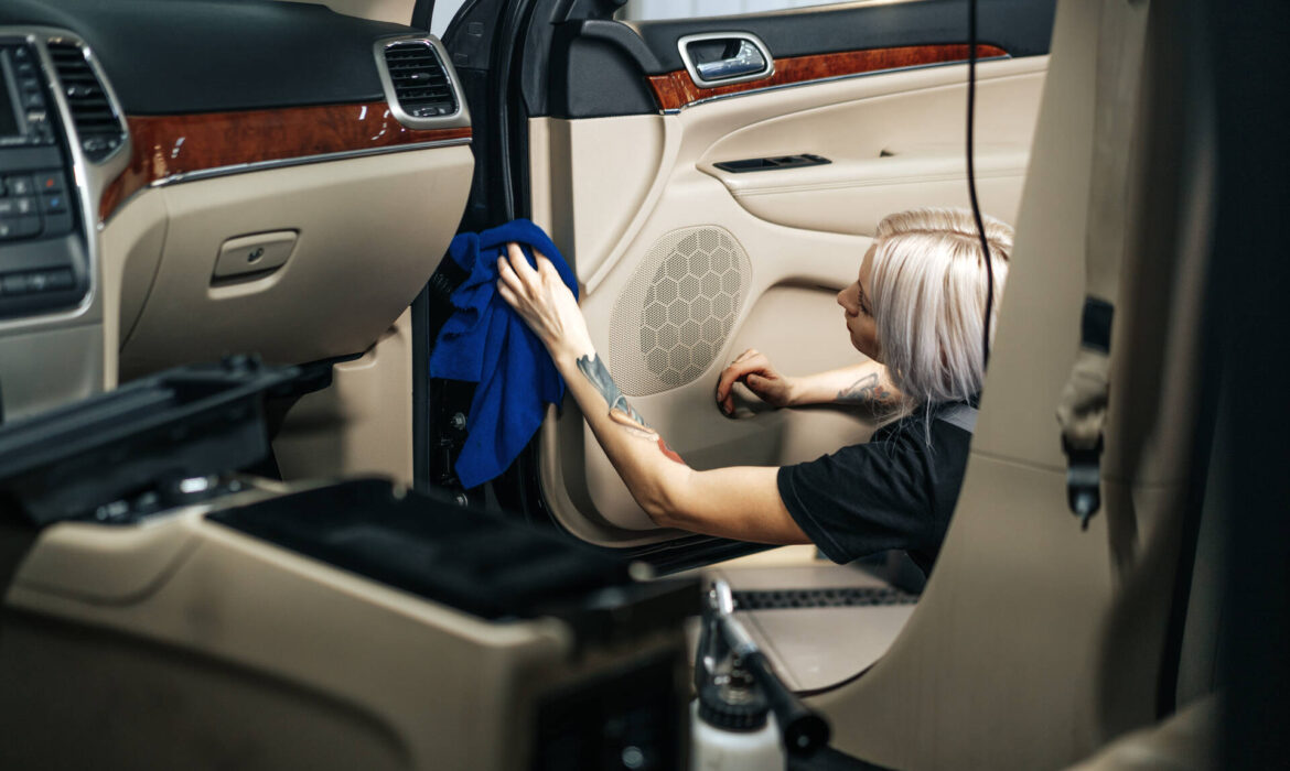 employee detailing a car in Texas