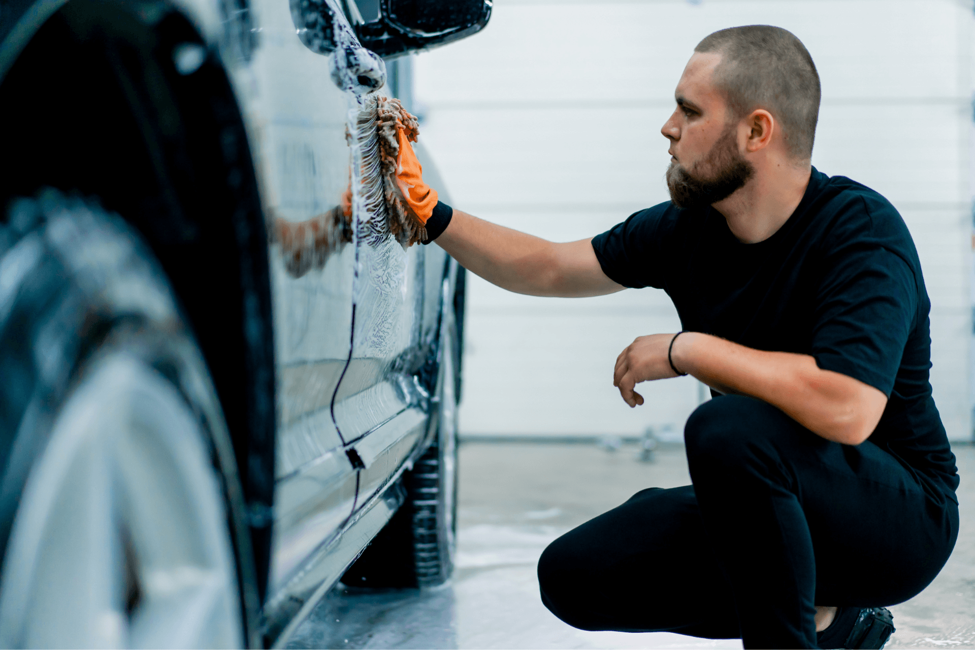 The Experts At WaterWerkz Detailing A Car In Texas